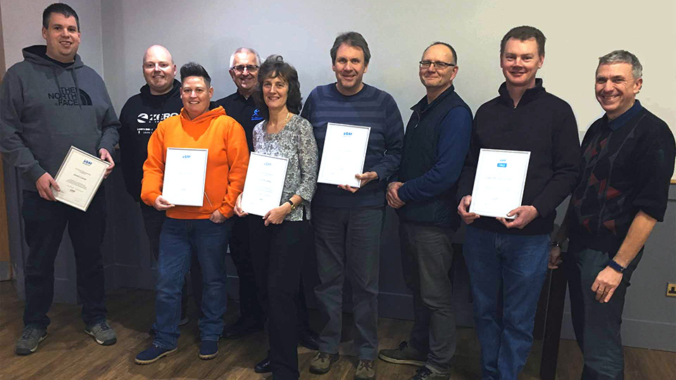 CWAM observers with their associates receiving their advanced motorcycle riding test certificates.